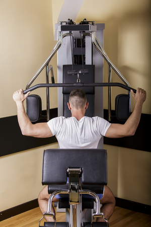 Young man training in the gym
