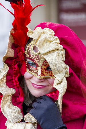 Venice, Italy - February 10, 2013  Unidentified person with Venetian carnival mask in Venice, Italy  At 2013 it is held from January 26th to February 12thのeditorial素材