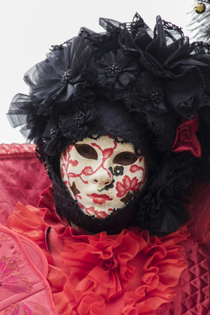Venice, Italy - February 10, 2013  Unidentified person with Venetian carnival mask in Venice, Italy  At 2013 it is held from January 26th to February 12thのeditorial素材