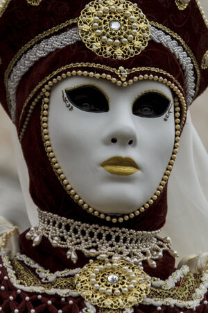 Venice, Italy - February 10, 2013  Unidentified person with Venetian carnival mask in Venice, Italy  At 2013 it is held from January 26th to February 12thのeditorial素材