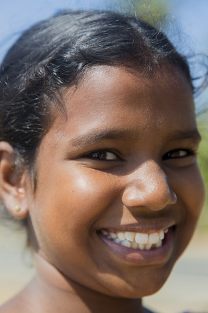 Nuwara, Sri Lanka - January 25, 2014  Unidentified girl on the street of Nuwara, Sri Lanka  It is...