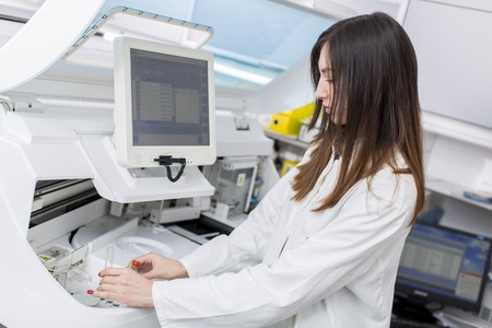 Young woman in the medical laboratoryの写真素材