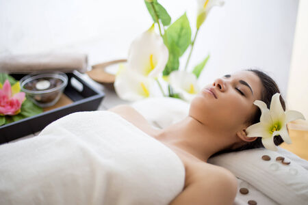 Pretty young woman having a massageの写真素材