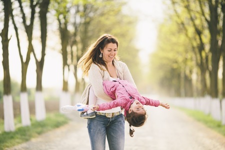 Mother and daughter having funの写真素材