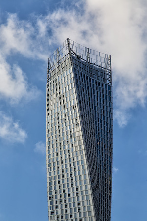 DUBAI, UAE - JANUARY 16, 2014: Detail of the Infinite tower in Dubai. Cayan Tower, known as Infinity...