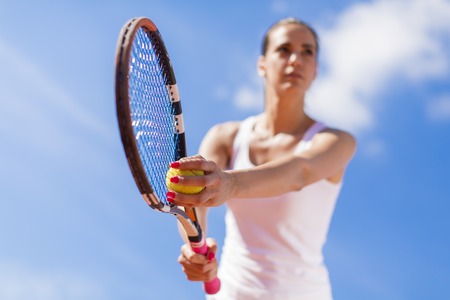 Young woman playing tennis
