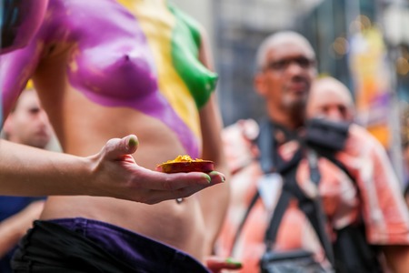 NEW YORK, USA - SEPTEMBER 19, 2011: Unidentified bodypainted woman by the artist Andy Golub at Times Square in New York. Golub is free to paint fully nude models in the public streets of New York Cityのeditorial素材