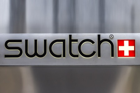 CATANIA, ITALY - APRIL 27, 2014: Detail of the Swatch store in Catania. Swatch is watch manufacturing company founded at 1983.のeditorial素材