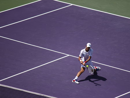 Miami, USA - April 1, 2012: Novak Djokovic at the final match at Sony Ericsson Open in Miami, USA at April 1, 2012.  Djokovic defeating Andy Murray 6-1, 7-6(4) to triumph for the third time at Crandon Parkのeditorial素材