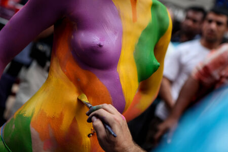 NEW YORK, USA - SEPTEMBER 19, 2011: Unidentified bodypainted woman by the artist Andy Golub at Times Square in New York. Golub is free to paint fully nude models in the public streets of New York Cityのeditorial素材