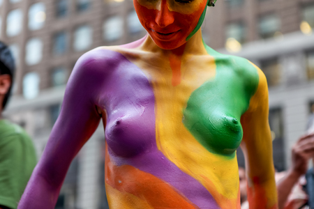 NEW YORK, USA - SEPTEMBER 19, 2011: Unidentified bodypainted woman by the artist Andy Golub at Times Square in New York. Golub is free to paint fully nude models in the public streets of New York Cityのeditorial素材