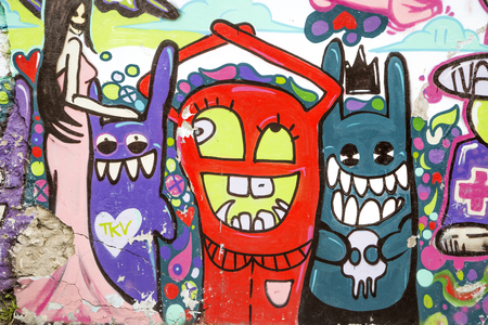 BELGRADE, SERBIA - APRIL 23, 2014: Graffiti on the walls in Savamala in Belgrade. Project "Red Bull Door Deco" transforms old and decayed doors at Savamala into creative field for graffiti artistsのeditorial素材