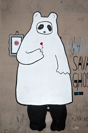 BELGRADE, SERBIA - APRIL 23, 2014: Graffiti on the walls in Savamala in Belgrade. Project "Red Bull Door Deco" transforms old and decayed entry doors at Savamala into creative field for the graffiti artistsのeditorial素材