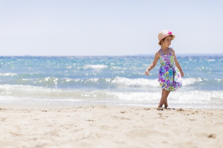 Cute little girl on the beachの写真素材
