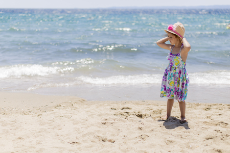 Cute little girl on the beachの写真素材