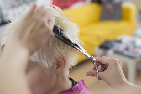 Young woman at hairdresserの写真素材