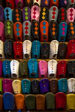 Colorful babiuches at souk in Marrakech, Moroccoの写真素材