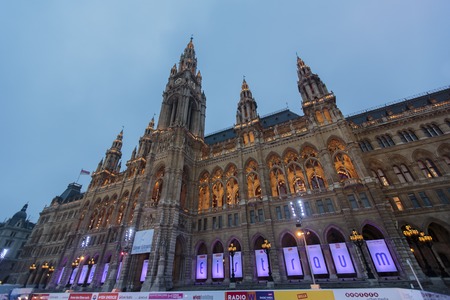 Vienna, Austria - February 5, 2014: Rathaus at Vienna at night. Every winter Rathausplatz is transformed into two connected 450 m2 ice rinks.のeditorial素材