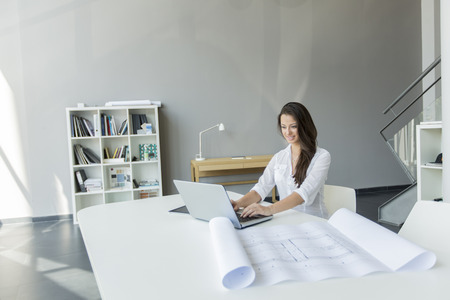 Young woman in the officeの写真素材