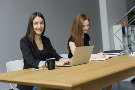 Young woman in the officeの写真素材
