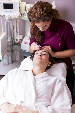 Young women having a cosmetic treatment