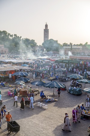 MARRAKESH, MOROCCO - SEPTEMBER 11, 2014: Unidentified people at Jeema el Fna in Marrakesh, Morocco. Jeema el Fna received UNESCO label of Masterpieces of the Oral and Intangible Heritage of Humanity.のeditorial素材