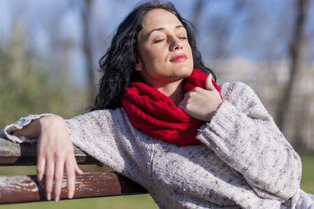 Cute young woman in the parkの写真素材