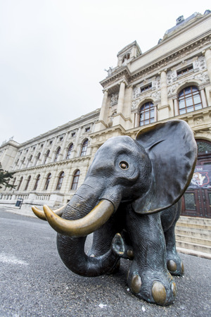 VIENNA, AUSTRIA - FEBRUARY 4, 2014: Bronze elephant in front of   Natural History Museum in Vienna. Sculpture was made by Gottfried Kumpf.のeditorial素材