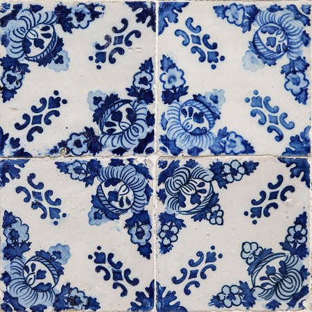 Traditional tiles from facade of old house in Porto, Portugalの写真素材