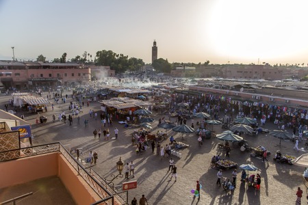 MARRAKESH, MOROCCO - SEPTEMBER 11, 2014: Unidentified people at Jeema el Fna in Marrakesh, Morocco. Jeema el Fna received UNESCO label of Masterpieces of the Oral and Intangible Heritage of Humanity.のeditorial素材