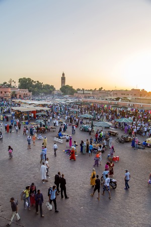 MARRAKESH, MOROCCO - SEPTEMBER 11, 2014: Unidentified people at Jeema el Fna in Marrakesh, Morocco. Jeema el Fna received UNESCO label of Masterpieces of the Oral and Intangible Heritage of Humanity.のeditorial素材
