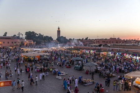 MARRAKESH, MOROCCO - SEPTEMBER 11, 2014: Unidentified people at Jeema el Fna in Marrakesh, Morocco. Jeema el Fna received UNESCO label of Masterpieces of the Oral and Intangible Heritage of Humanity.のeditorial素材