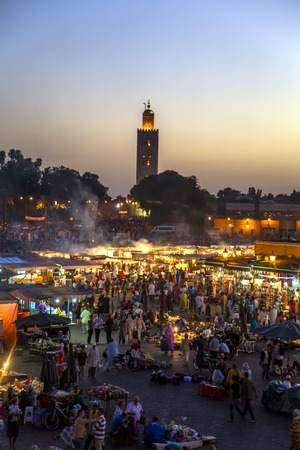 MARRAKESH, MOROCCO - SEPTEMBER 11, 2014: Unidentified people at Jeema el Fna in Marrakesh, Morocco. Jeema el Fna received UNESCO label of Masterpieces of the Oral and Intangible Heritage of Humanity.のeditorial素材