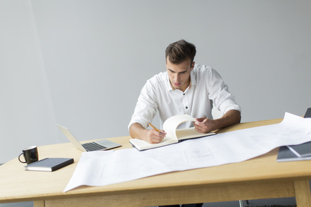 Young man in the officeの写真素材
