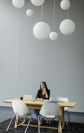 Young woman working in the officeの写真素材