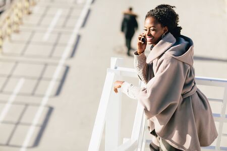 Young black woman on the streetの写真素材