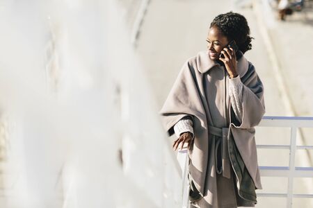 Young black woman on the streetの写真素材