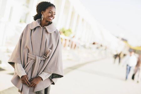 Young black woman on the streetの写真素材