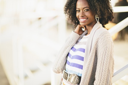 Young black woman on the streetの写真素材