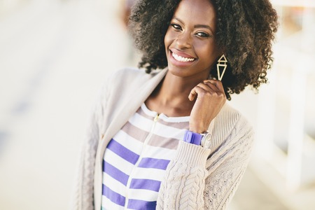 Young black woman on the streetの写真素材