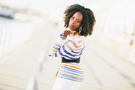 Young black woman on the streetの写真素材