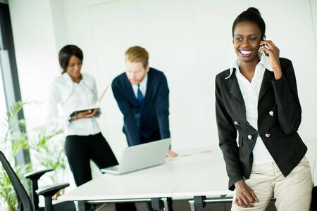 Young woman in the officeの写真素材