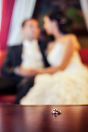 Wedding rings and wedding coupleの写真素材