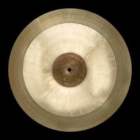Isolated single cymbal on blackの写真素材