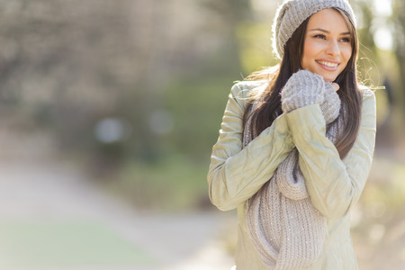 Pretty young woman in the parkの写真素材