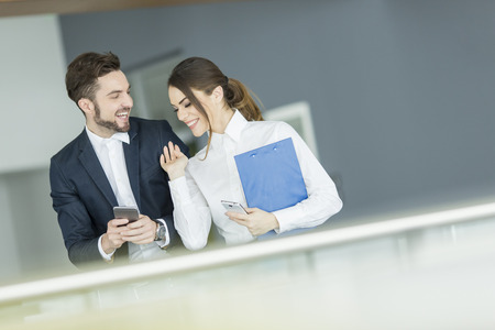 Young couple working in the officeの写真素材