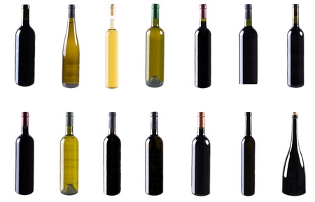 Red and white wine bottles isolated on whiteの写真素材