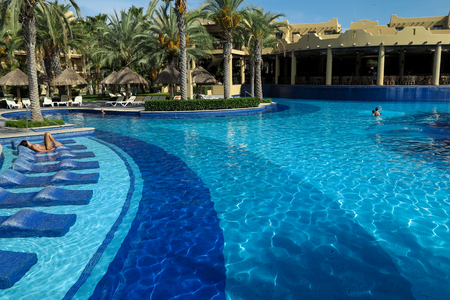 CABO SAN LUCAS, MEXICO - AUGUST 8, 2014: Unidentified people at RIU Santa Fe Hotel at Cabo San Lucas, Mexico. It is a 5 star hotel at Baja California with 902 guest rooms.のeditorial素材