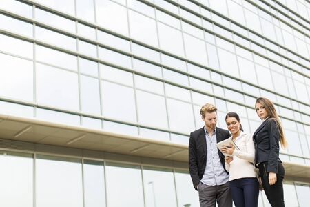 Young business people outdoorsの写真素材