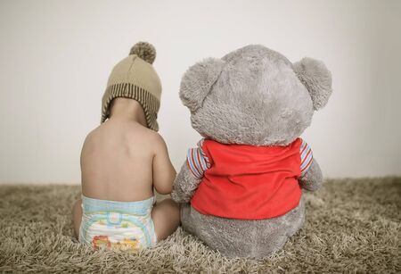 Baby and bearの写真素材